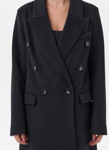 Длинное двубортное пальто с английским воротником