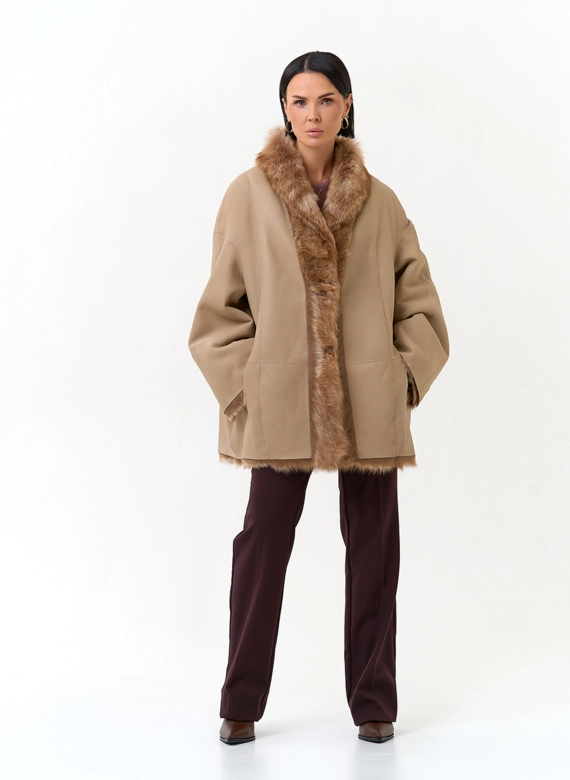Женская двухсторонняя дубленка фото
